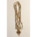 Italian foxtail link chain marked 750, approx 5g, hung with an unmarked gold colour pendant