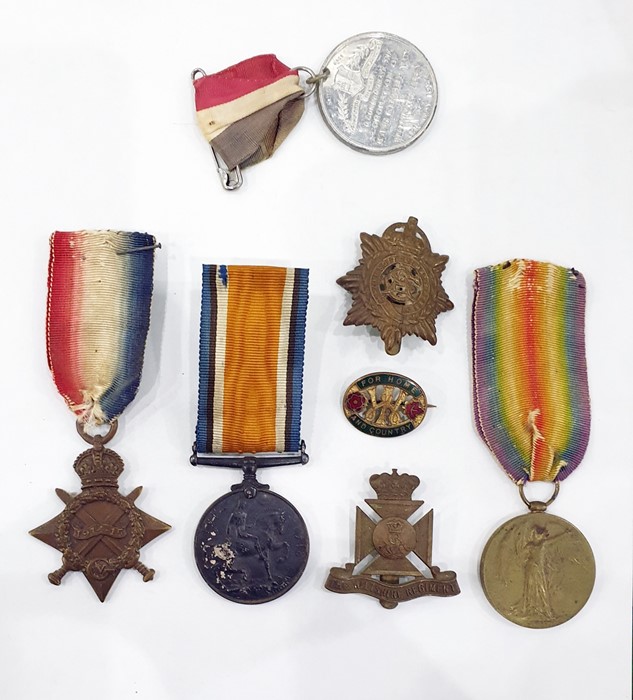 Group of three WWI medals awarded to Private L F Wood ASC, comprising the War medal, Victory medal