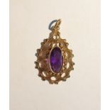 Gold-coloured metal and amethyst pendant set single oval facet-cut amethyst within openwork bark-