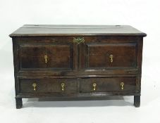 17th century oak mule chest, the rectangular top with moulded edge, opening to reveal candle box,