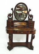Victorian rosewood dressing table, the oval mirror above assorted drawers, above base of single