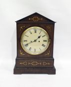 19th century mahogany and brass inlaid chiming bracket clock, the arched top above the circular dial