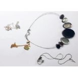 Large quantity of assorted costume jewellery to include necklaces, brooches, etc