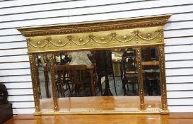 Reproduction gilt Adam style mirror, with ornate foliate pediment, ribbon and husk swag frieze