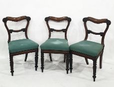 Set of six Victorian mahogany balloon back dining chairs with foliate decoration, upholstered seats,