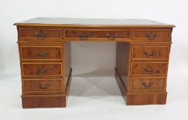 20th century yew pedestal desk with green leatherette inset top, assorted drawers, 136cm x 78cm