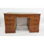 20th century yew pedestal desk with green leatherette inset top, assorted drawers, 136cm x 78cm