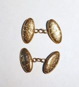 Pair 9ct gold double-oval and chain cufflinks, each foliate engraved, approx 5g total