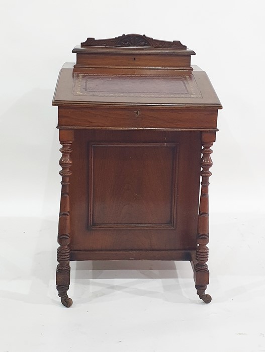 Late 19th/early 20th century oak Davenport desk, on turned ring front supports and the whole