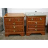 Pair of 20th century yew bedside chests, the rectangular tops with canted corners, above two short