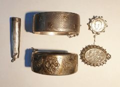Silver hinged bangle by Smith & Pepper of Birmingham decorated with gilt flowerheads, another silver