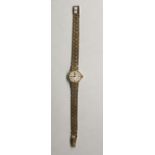 Lady's 9ct gold Omega wristwatch with circular dia