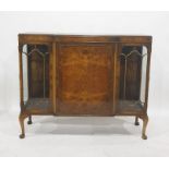 20th century walnut breakfront cabinet with panelled central drawer flanked by astragal-glazed
