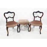 Pair of Victorian mahogany bedroom chairs with carved back rails, upholstered seats, on cabriole