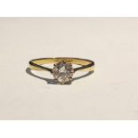 18ct gold, platinum and diamond solitaire ring, th