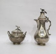 Eastern white metal baluster coffee pot, the domed lid with peacock finial and a similar two-handled