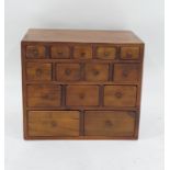 Eastern hardwood 20th century chest of 14 assorted drawers, 37.5cm x 33cm