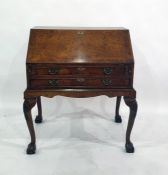 20th century burr walnut lady's bureau, the sloping fall-front enclosing concave fitted interior