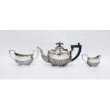 Edwardian silver bachelor's three-piece teaset by Marston & Bayliss, Birmingham 1901, of half-fluted