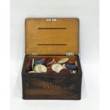 Rosewood and inlaid box and contents of assorted tokens