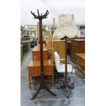 20th century mahogany hat and coat stand on faceted and fluted central column to triform base and