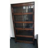 20th century oak five-sectional bookcase of narrow form, 87cm x 174cm