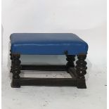 Low stained oak footstool with blue leatherette se