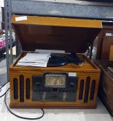 Crosley reproduction gramophone with radio and CD player, all cased within a vintage-style wooden