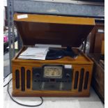 Crosley reproduction gramophone with radio and CD player, all cased within a vintage-style wooden