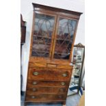 George III inlaid mahogany secretaire bookcase, the top section with line inlaid frieze, three