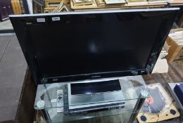 Panasonic 39" BBE Viva flatscreen television with a VHS and DVD recording and playback machine,