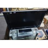 Panasonic 39" BBE Viva flatscreen television with a VHS and DVD recording and playback machine,