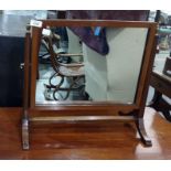 19th century mahogany rectangular swing framed mirror, the frame united by stretcher, on cabriole