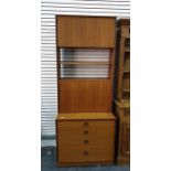 G-Plan lounge unit in teak, with two cupboard doors above two shelves above four enclosing shelf, on