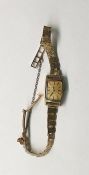 Lady's 9ct gold Rotary wristwatch and the bark-pat