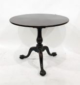 Mahogany snap-top tripod occasional table having baluster column on claw and ball feet (circular top