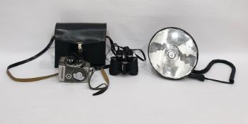 Yashica 8-E III camera, a pair of Boots Admiral 8x30 field binoculars and a spot lamp