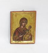 Painted hardwood icon, the Madonna and Child, on a