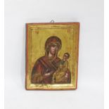 Painted hardwood icon, the Madonna and Child, on a