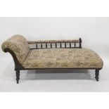 Victorian oak-framed chaise longue on turned supports to brown china castors