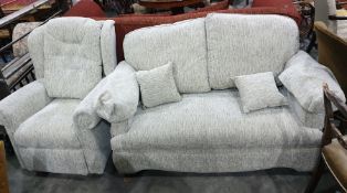 Two seater sofa and single armchair in a light grey upholstery