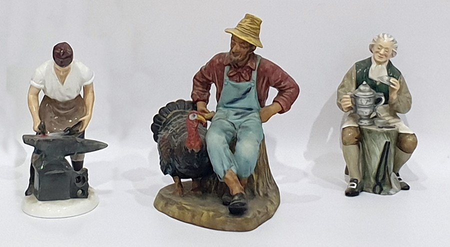 Royal Doulton figure 'The Tinsmith' HN2146, 16.5cm high, another 'The Blacksmith of Williamsburg'