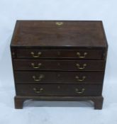 A 19th century mahogany bureau of four long drawers, to bracket feet, brass handle and escutcheon,