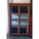 Continental oak display cabinet, the glazed doors enclosing four shelves, 100cm x 171cm