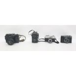 Quantity of cameras, camera cases, lenses, etc including Vivitar, Coronet, Beirette, Zenit, etc (1