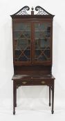 Late 19th/early 20th century mahogany Chippendale style wall-hanging display cabinet on stand having