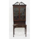 Late 19th/early 20th century mahogany Chippendale style wall-hanging display cabinet on stand having