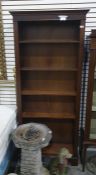 A 20th century mahogany open bookcase, 73cm x 181cm
