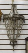Three-light wall light with strung glass beaded shade  Condition ReportThere are a few holes where