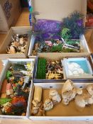 Five boxes of assorted child's toys to include farm animals, trees and straw dolls, etc